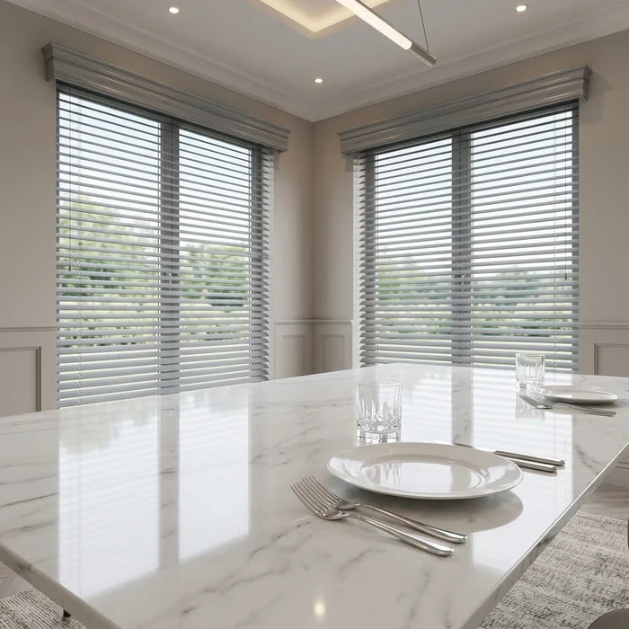 Hardwood Cordless Horizontal Blinds in White effortlessly filter natural light, harmonizing with the room's soft ambiance and minimalist furniture arrangement.