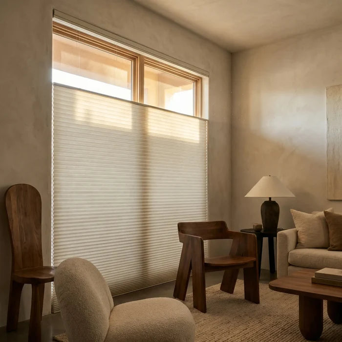 Interior view of a modern living space styled with Creamy 3 8 Budget Single Cell Light Filtering Top Downbottom Up Shades, protecting against UV rays while offering top-down versatility.