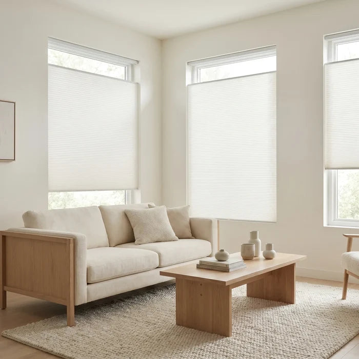 Custom window treatments: Creamy White 3 8 Budget Single Cell Light Filtering Top Downbottom Up Shades shown in a modern living space, softening incoming light with dual-directional adjustments.