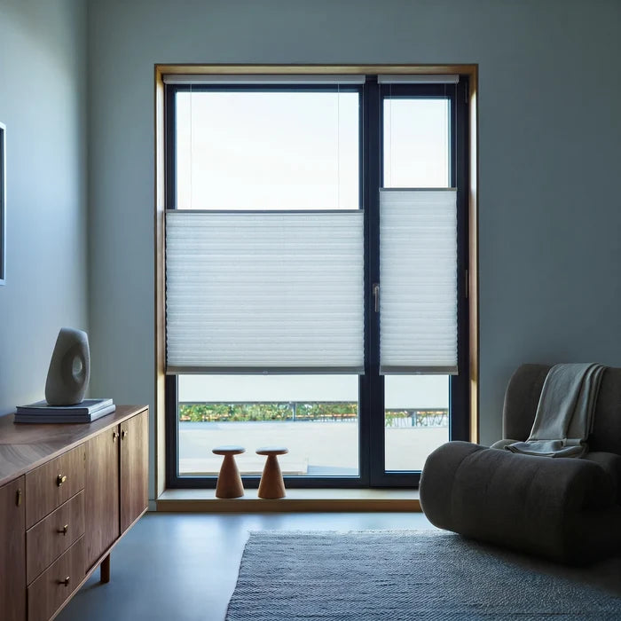 Styling a modern living room with Creamy White 3 8 Budget Single Cell Light Filtering Top Downbottom Up Shades, allowing soft natural light while maintaining adjustable privacy.