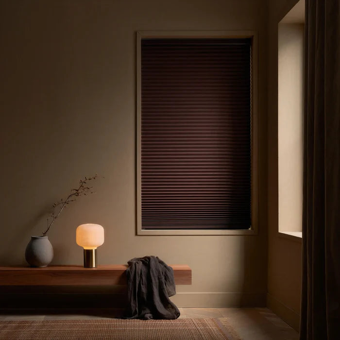 This warm living space is enhanced by Warm Brown (Sticks And Stones) 9 16 Inch Classic Single Cell Blackout Cordless Shades, delivering superior room-darkening performance.