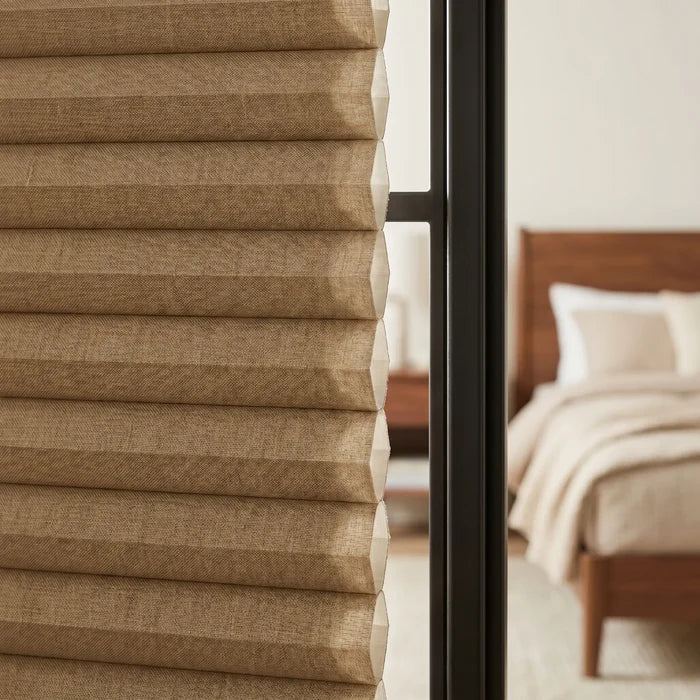 Styling a modern bedroom with Warm Brown 1 2 Inch Budget Single Cell Blackout Cordless Shades, providing complete light blockage and privacy.
