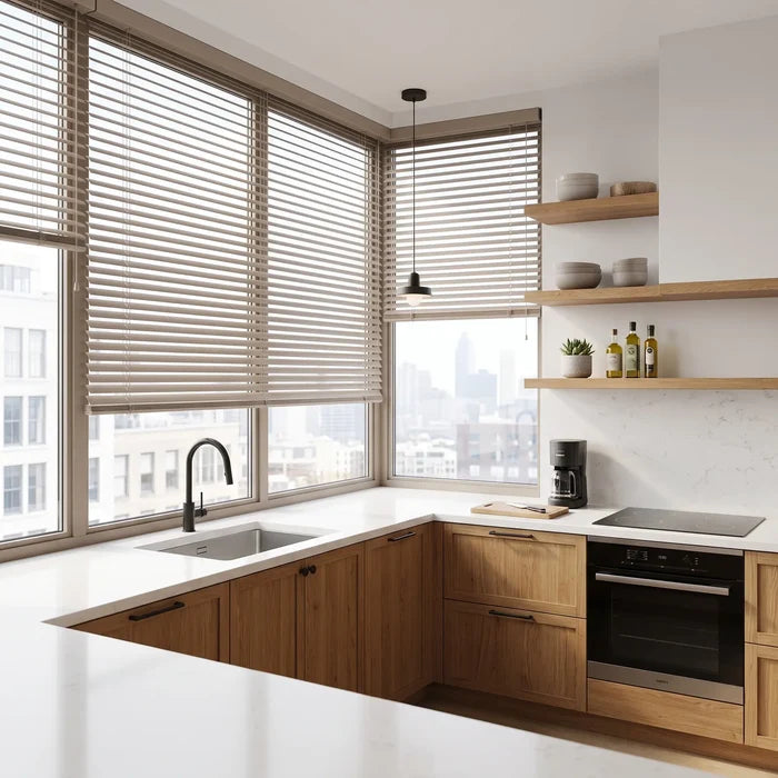 A look at White Classic Cordless 8g Aluminum Mini Blinds inside a elegant kitchen, perfect for high-traffic areas requiring durable light management.