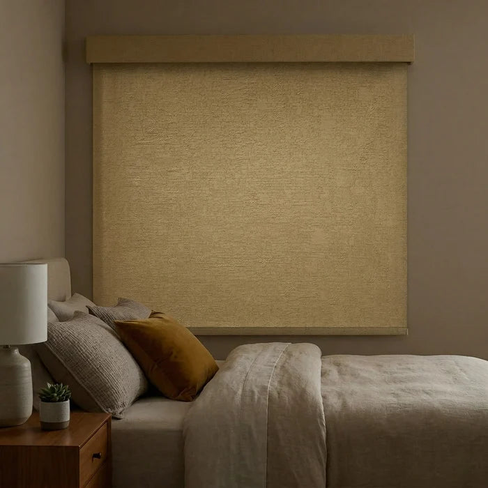 Outside mount Jerusalem Gold Luxe room darkening shades installed over a bedroom window for maximum light blockage.