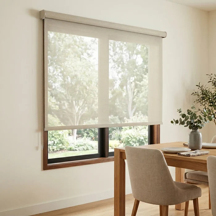 Premier 10% Solar Screen Roller Shade's creamy white hue enhances this modern dining area, providing UV protection while maintaining a calm atmosphere.