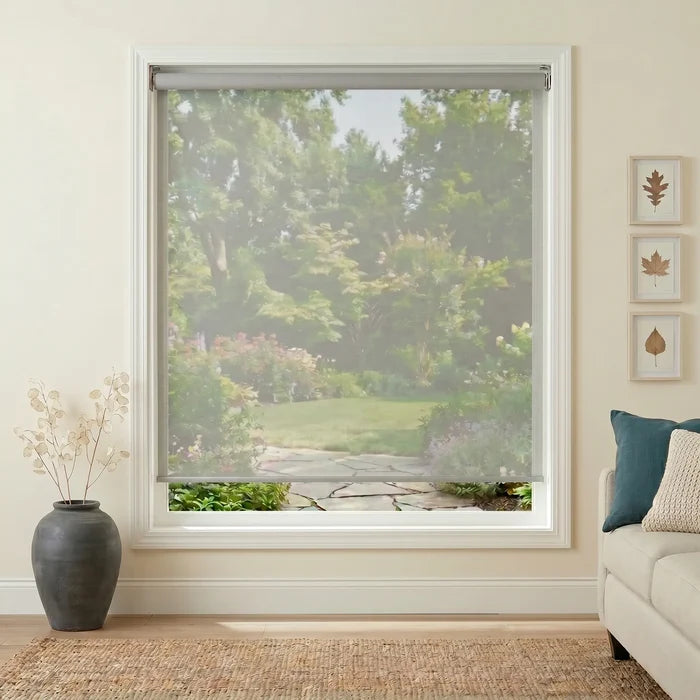 Premier 14% Solar Screen Roller Shade in a sun-drenched living room, filtering warm light with subtle elegance and UV protection.