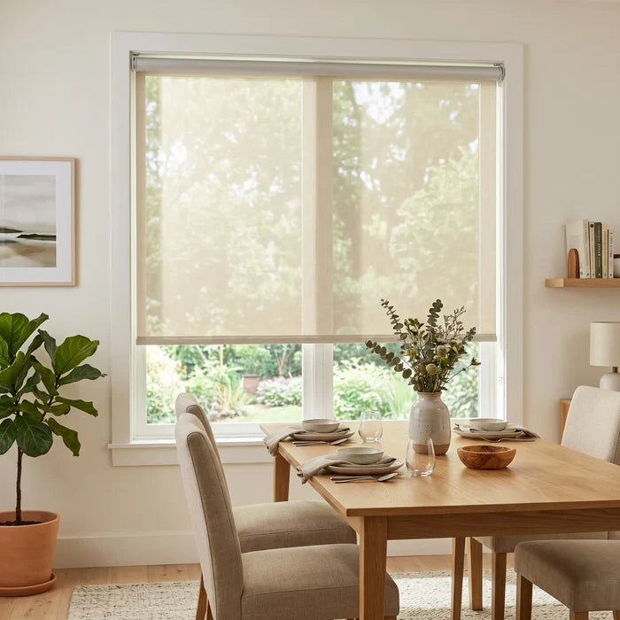 Premier 5% Solar Screen Roller Shade filters natural light while maintaining a warm beige tone in this inviting dining area.