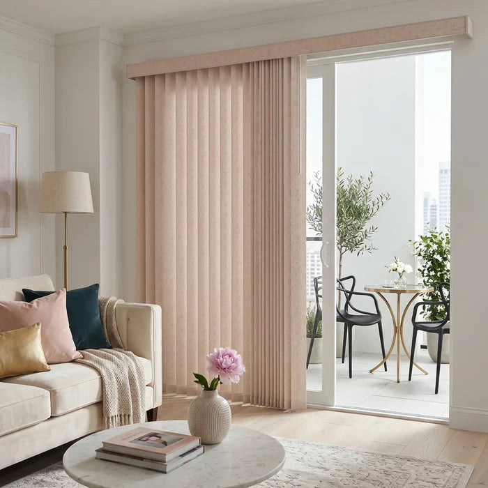 Styling a warm living room with Soft Pink Premier Pvc Vertical Blinds, ideal for expansive windows requiring versatile light management.