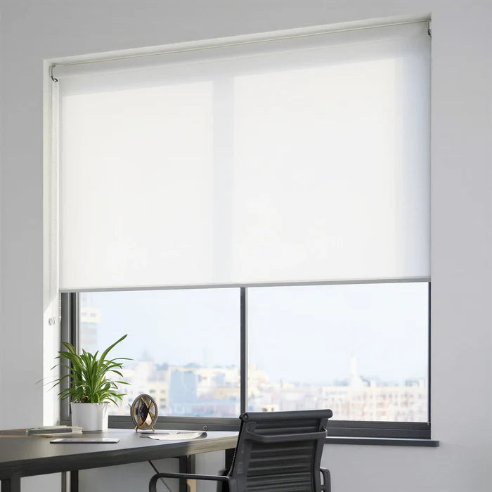 Clean white ProGrade solar shades with 5 percent openness in a bright home office setting.
