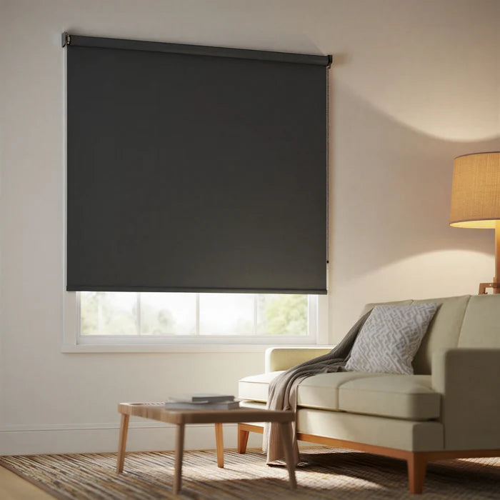 Contextual view of a single dark grey charcoal outside mount installed signature room darkening roller shade in a minimalist interior modern interior