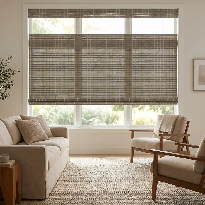Elegant living space features Woven Wood Cordless Top Down Bottom Up Shades in Beige, effortlessly filtering sunlight and providing adjustable privacy with their versatile lighting capabilities.