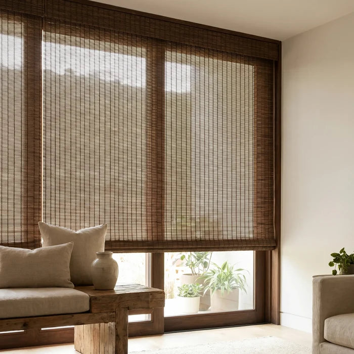 Warm up your space with Woven Wood Cordless Top Down Bottom Up Shades, adding a touch of rustic charm with adjustable privacy and versatile lighting solutions.