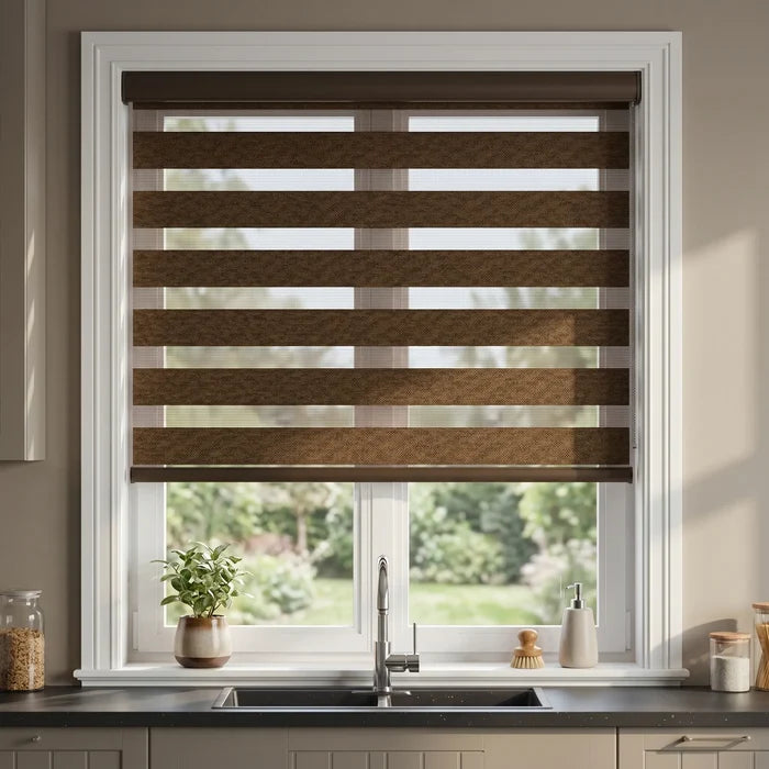 Zebra Room Darkening Roller Shades adorn this modern kitchen, filtering natural light through their brown and white striped design.
