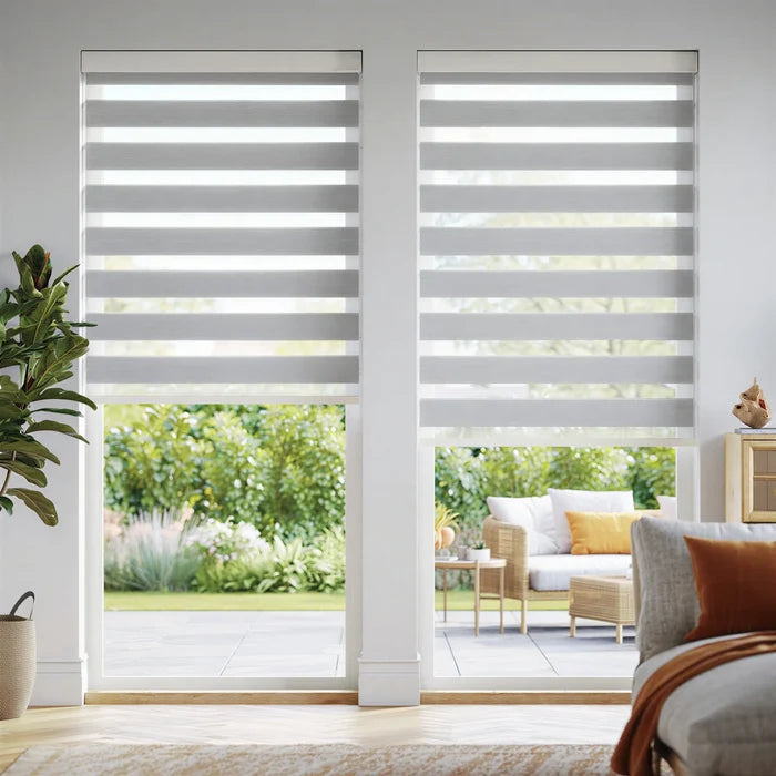 Zebra Solar Roller Shades in Creamy White complement this cozy living room, providing UV protection while allowing natural light to filter through